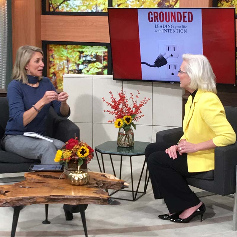 A photograph of Nancy M. Dahl on the KARE 11 Television set with Belinda Jenson.