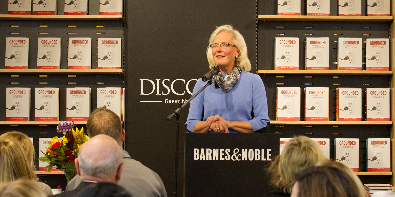 A photograph of Nancy M. Dahl speaking at her book launch at Barnes and Noble